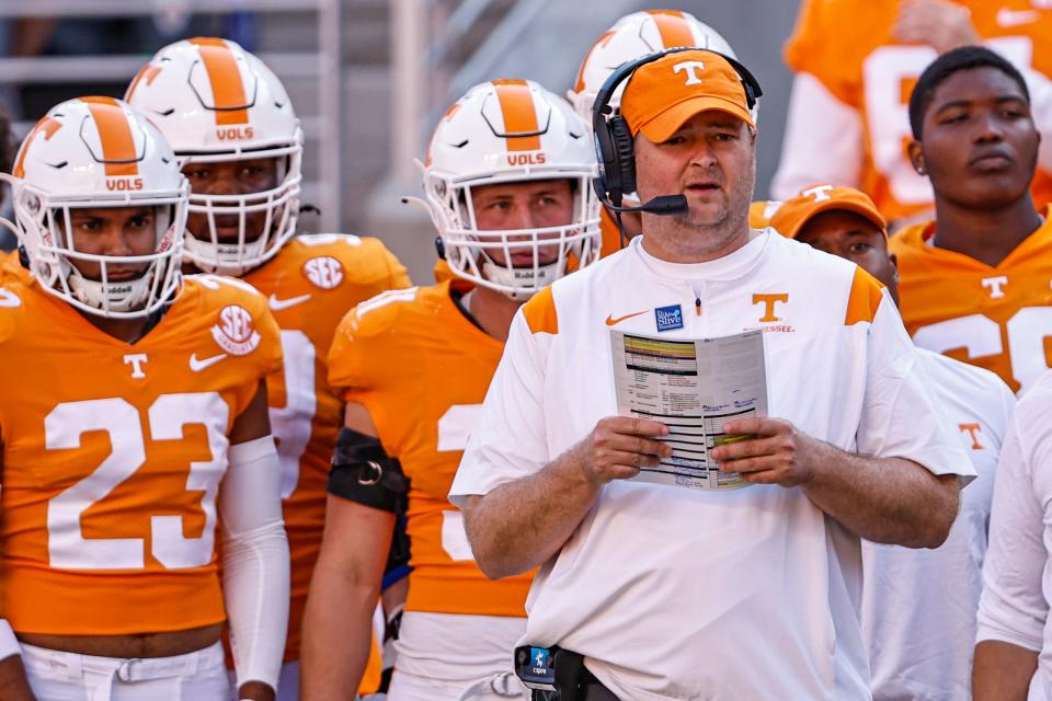 Tennessee head coach Josh Heupel watches his team during the first half of an NCAA college football game against Florida, Saturday, Sept. 24, 2022, in Knoxville, Tenn. (AP Photo/Wade Payne)