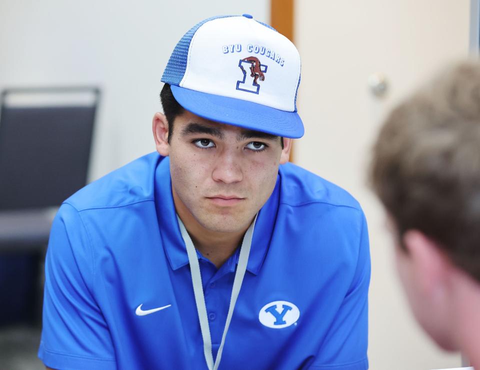 BYU receiver Puka Nacua is interviewed during BYU football media day in Provo on Wednesday, June 22, 2022.