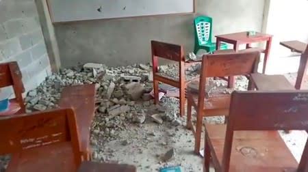 Concrete rubble are seen on the floor of a classroom at Al Anshor Islamic Boarding School after an earthquake in Ambon