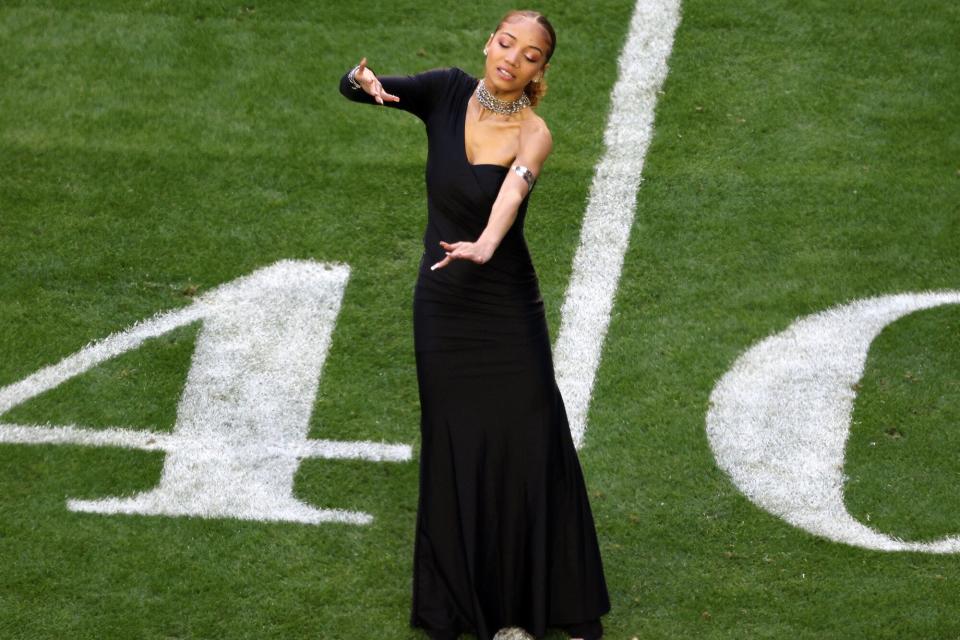 Justina Miles performs "Lift Every Voice and Sing" in American Sign Language prior to Super Bowl LVII between the Kansas City Chiefs and Philadelphia Eagles at State Farm Stadium on February 12, 2023 in Glendale, Arizona.