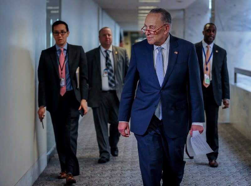 U.S. Senate Minority Leader Chuck Schumer (D-NY) arrives for a meeting with Treasury Secretary Steve Mnuchin to wrap up work on coronavirus economic aid legislation to prevent the spread of coronavirus disease (COVID-19) in Washington