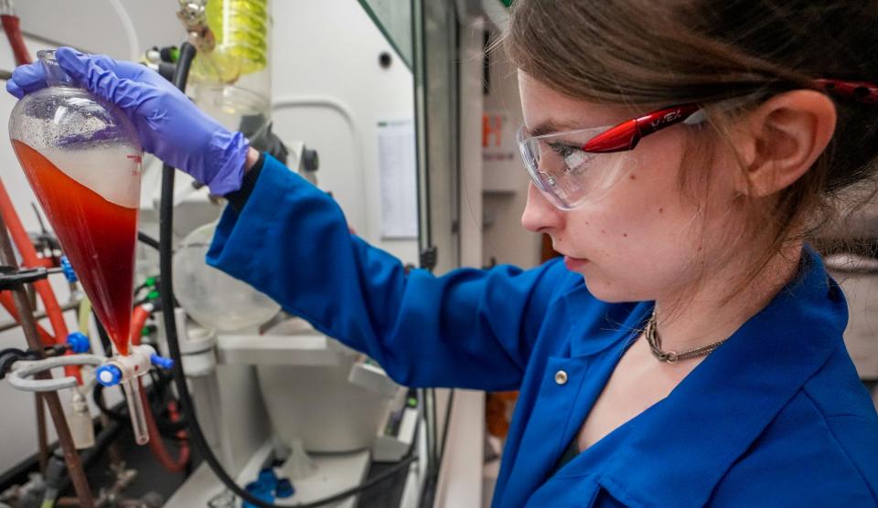 Usona Institute chemist intern Elise Burkhrtzmeyer, 20, works on the Williamson ether synthesis at Promega Feynman Center in Fitchburg. Burkhrtzmeyer is a junior at UW-Madison majoring in chemistry. "Chemistry is my life," she explained. "I love doing it and here I have a lot of opportunities."