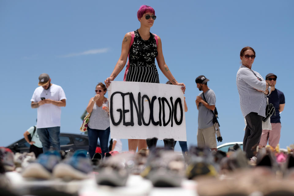 Hundreds of shoes are displayed on June 1 at Puerto Rico’s Capitol in memory of those killed by Hurricane Maria. (Photo: Ricardo Arduengo/AFP/Getty Images)