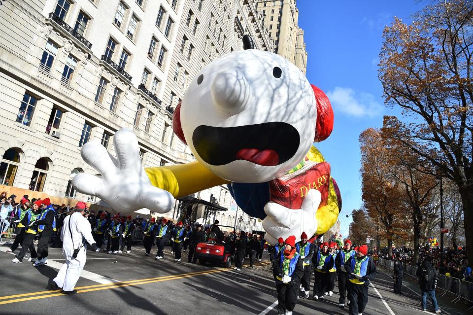 The balloon version of <em>Diary of a Wimpy Kid</em>'s Greg Heffley had the character clutching his trademark diary, which can be seen here.