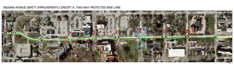 An aerial view of the proposed 'concept A,' which would close one lane of vehicle traffic along Indiana Avenue and create a protected, two-way bike lane. The concept would also add raised crosswalks and an improved bus station.