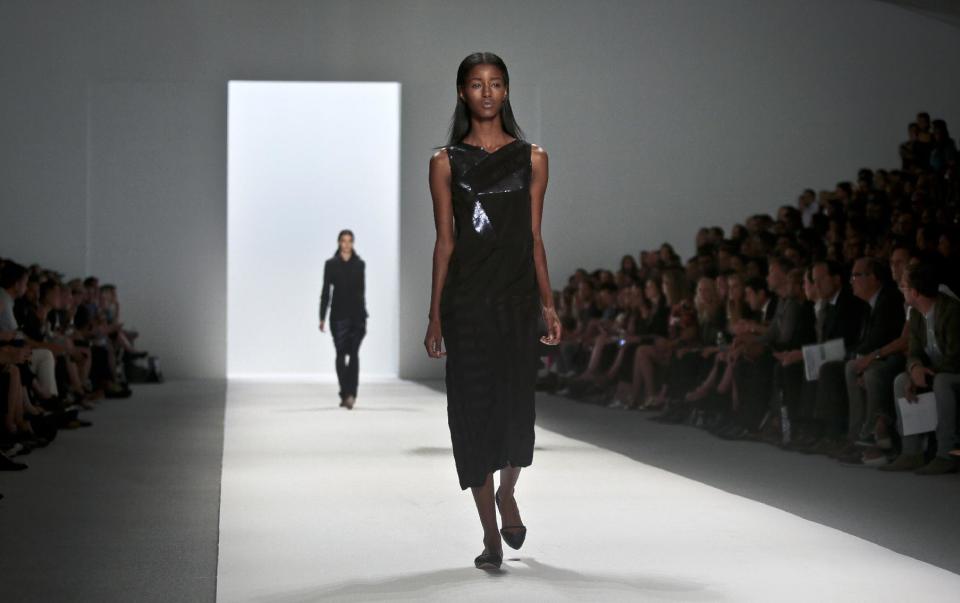 Fashion from the Richard Chai Spring Summer 2014 collection is modeled on Thursday, Sept. 5, 2013, during Fashion Week in New York. (AP Photo/Bebeto Matthews)
