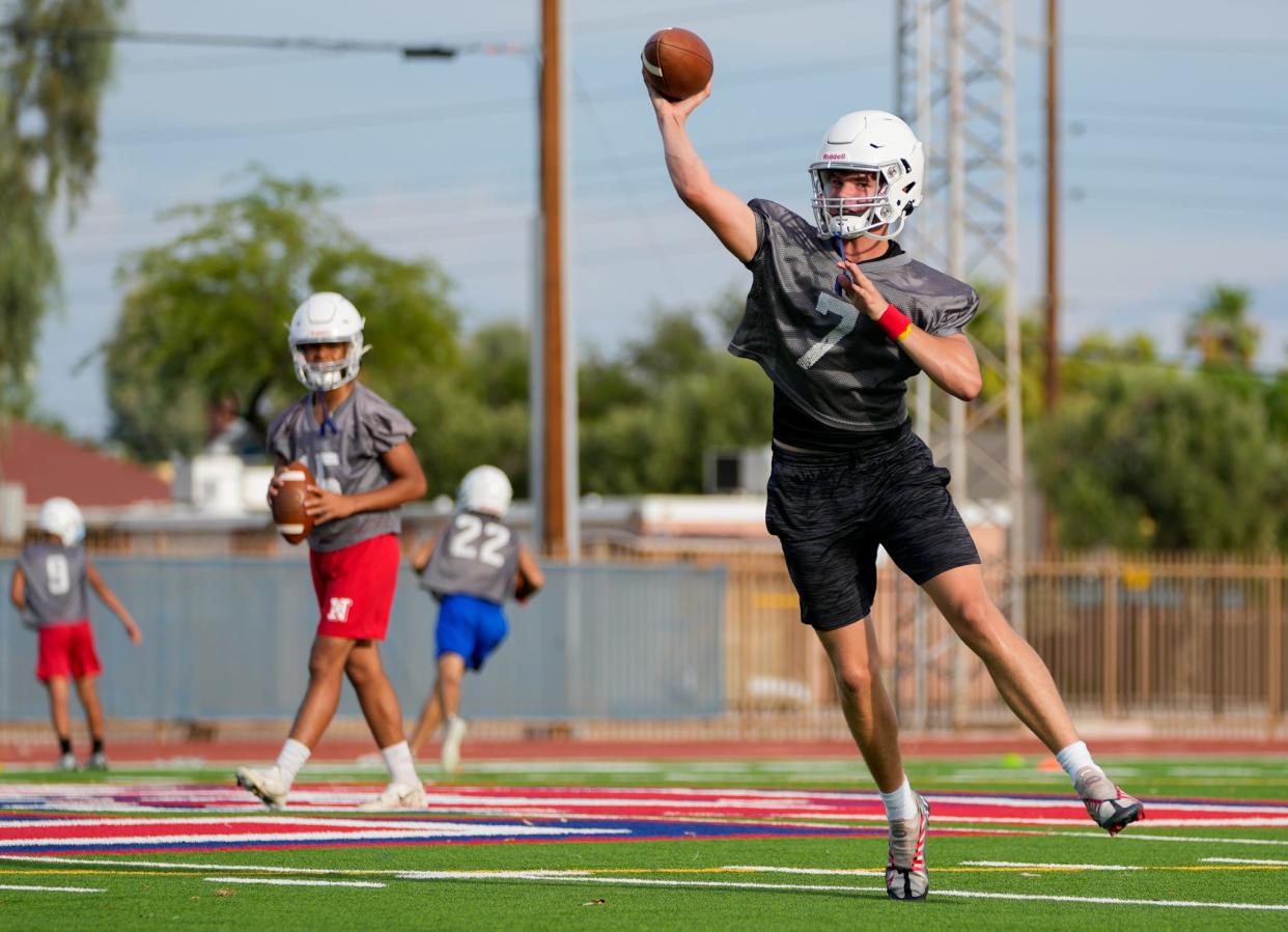 Aug. 9, 2022; Phoenix, Ariz., U.S.; Sophomore quarterback Luke Haugo (7) throws the ball during practice at North High School in Phoenix.