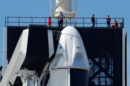 A SpaceX Falcon 9 carrying the Crew Dragon spacecraft sits on launch pad 39A prior to the uncrewed test flight to the International Space Station from the Kennedy Space Center in Cape Canaveral, Florida, U.S., March 1, 2019. REUTERS/Mike Blake