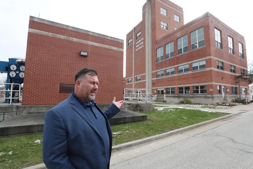 Jeffrey Bronowski, Akron water supply bureau manager, talks about the needs of the Akron Water Supply Plant outside a building that was built in the 1950s near Lake Rockwell in Kent.