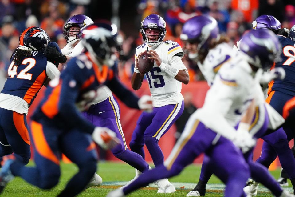 Nov 19, 2023; Denver, Colorado, USA; Minnesota Viking quarterback <a class="link " href="https://sports.yahoo.com/nfl/players/30248" data-i13n="sec:content-canvas;subsec:anchor_text;elm:context_link" data-ylk="slk:Joshua Dobbs;sec:content-canvas;subsec:anchor_text;elm:context_link;itc:0">Joshua Dobbs</a> (15) drops back to pass against the <a class="link " href="https://sports.yahoo.com/nfl/teams/denver/" data-i13n="sec:content-canvas;subsec:anchor_text;elm:context_link" data-ylk="slk:Denver Broncos;sec:content-canvas;subsec:anchor_text;elm:context_link;itc:0">Denver Broncos</a> in the first half at Empower Field at Mile High. Mandatory Credit: Ron Chenoy-USA TODAY Sports