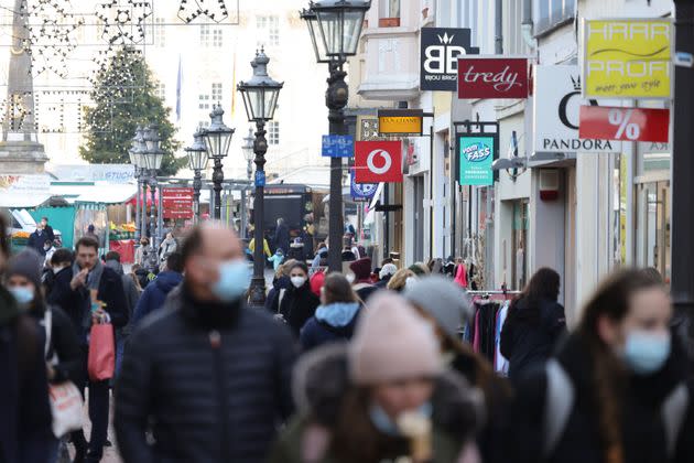 BONN, GERMANY - DECEMBER 22: People crowd a pedestrian shopping street in the city center during the fourth wave of the coronavirus pandemic on December 22, 2021 in Bonn, Germany. German authorities have announced limited restrictions to go into effect on December 28 in an effort to slow the anticipated spread of the Omicron coronavirus variant, though some health experts, including the head of the Robert Koch Institute, Lothar Wieler, are urging an immediate and stronger lockdown. Germany has registered Omicron cases but so far infection rates are still falling as the fourth wave continues to ease. (Photo by Andreas Rentz/Getty Images) (Photo: Andreas Rentz via Getty Images)