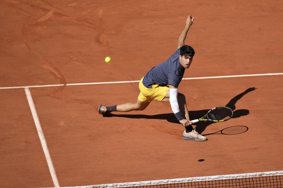 Spain's Carlos Alcaraz plays a shot against Italy's Jannik Sinner during their semifinal match of the French Open tennis tournament at the Roland Garros stadium in Paris, Friday, June 7, 2024. (AP Photo/Christophe Ena)