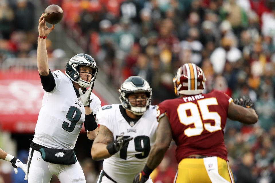 Philadelphia Eagles quarterback Nick Foles (9) passes the ball during the first half of an NFL football game against the Washington Redskins, Sunday, Dec. 30, 2018 in Landover, Md. (AP Photo/Andrew Harnik)