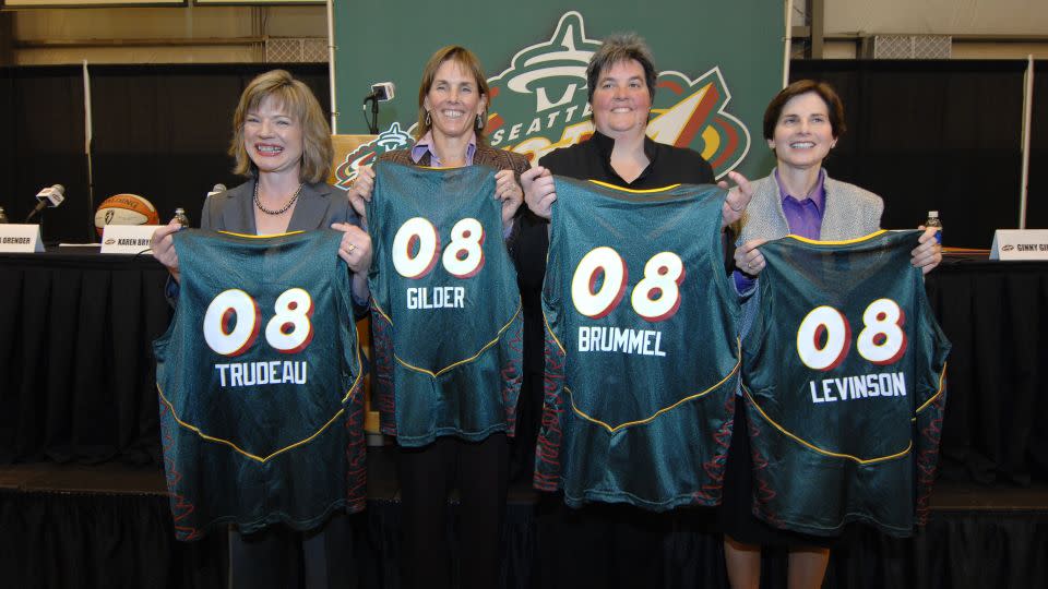 New owners of the Seattle Storm Anne Levinson, Dawn Trudeau, Lisa Brummel, and Ginny Gilder hold up personalized Storm Jerseys at a press conference on January 8, 2008 in Seattle, Washington. - Terrence Vaccaro/NBAE/Getty Images