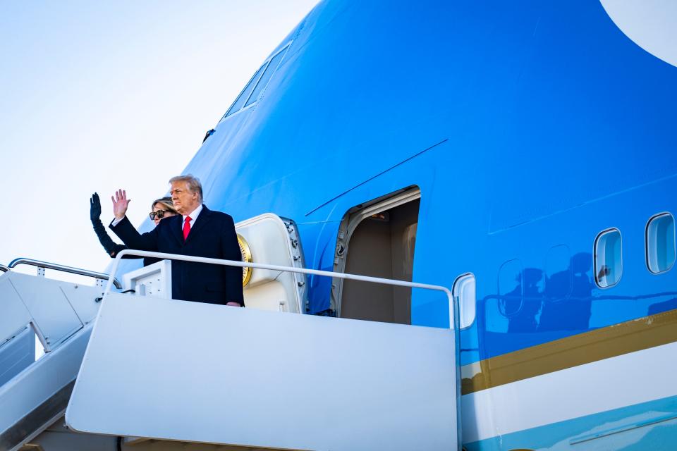 Donald Trump and Melania Trump board Air Force One for the last time at Joint Base Andrews, January 20, 2021.