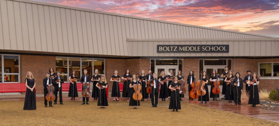 The Boltz Middle School Chamber Orchestra is pictured outside the school. The orchestra traveled to San Francisco from March 23-26 to participate in the Festival of Gold.