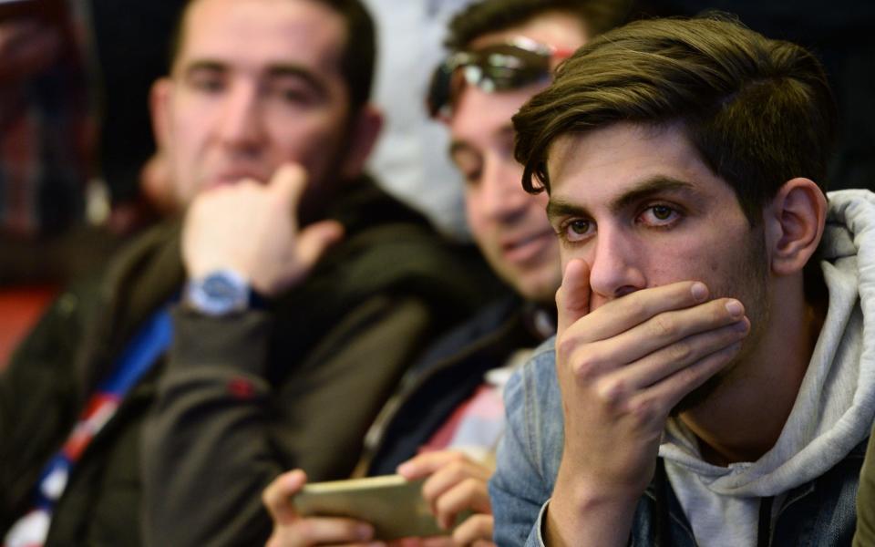 Supporters of Republican People's Party (CHP) watch the polling results during a referendum in Ankara, April 16, 2017 - Credit: Erhan Ortac/Getty Images