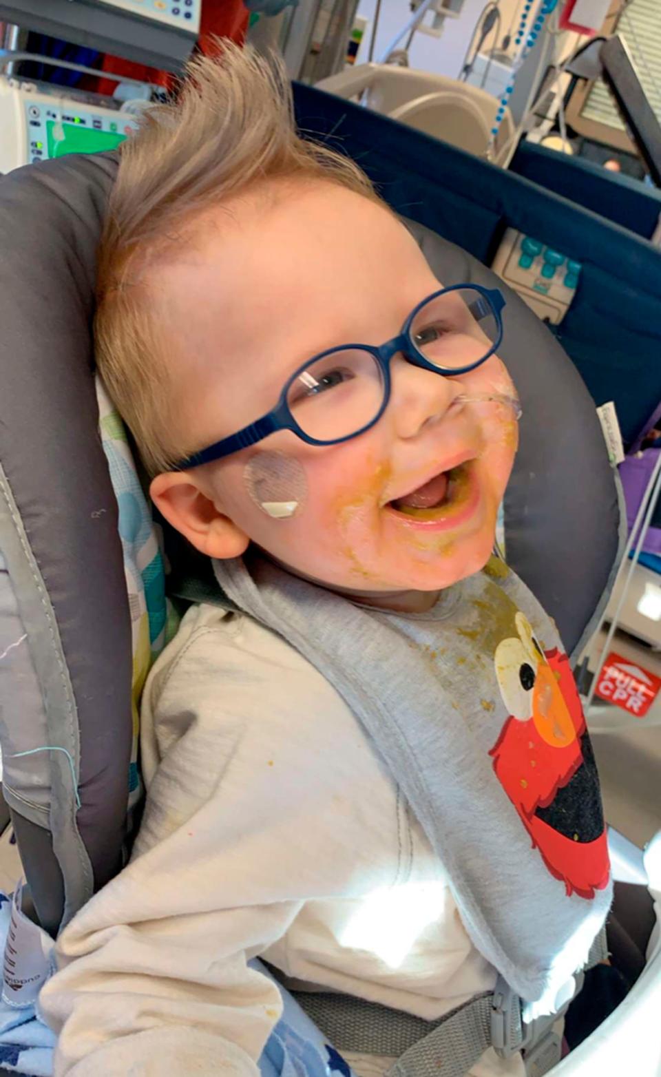 This photo provided by Reeanne Parisien shows her son, Greyson, smiling while at the Mayo Clinic in Rochester, Minn., in March 2019. Greyson's journey to correct a heart defect led the Turtle Mountain Band of Chippewa Indians to designate a spot on tribal IDs for organ donation. (Reeanne Parisien via AP)