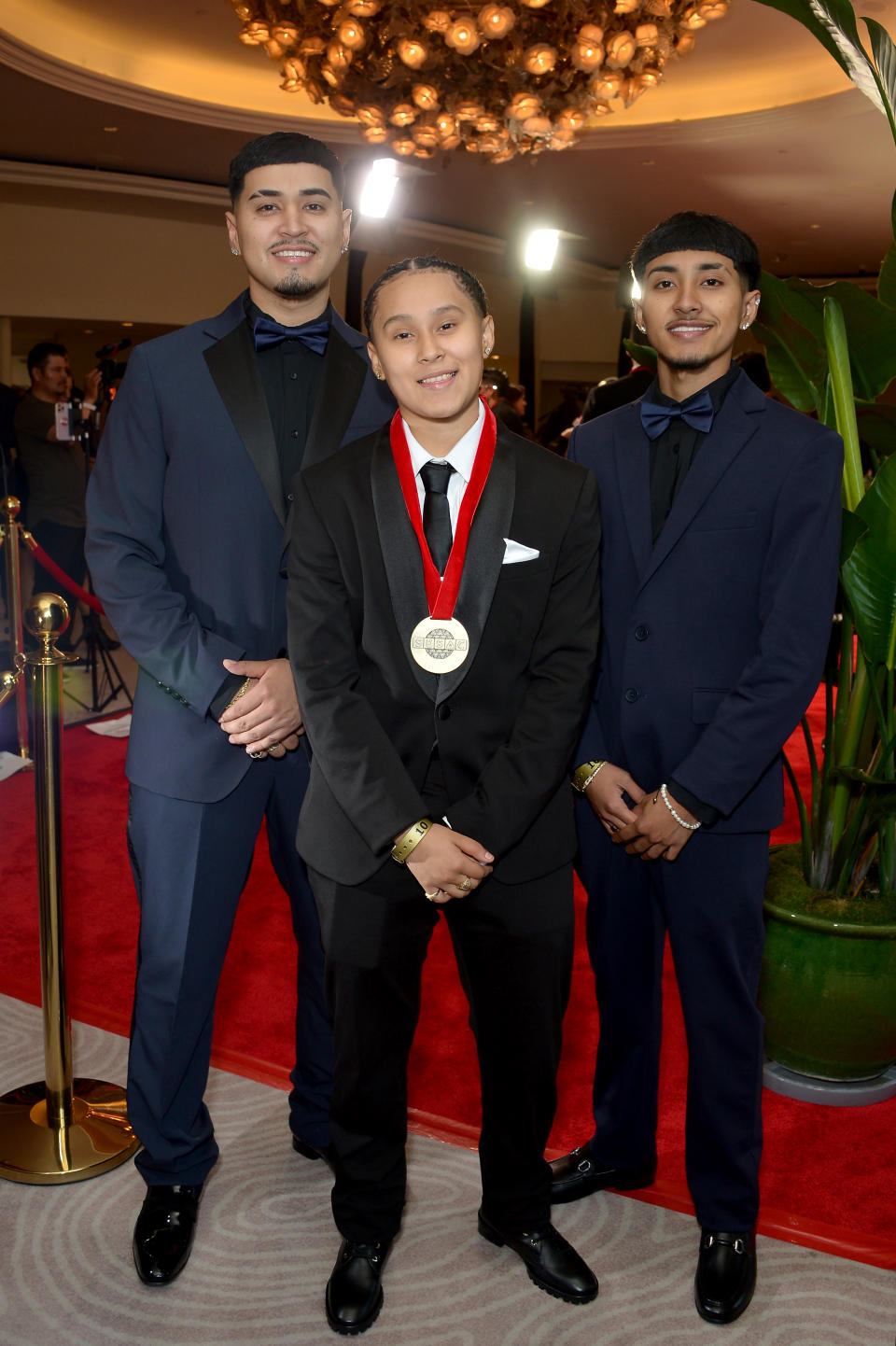 Yahritza y Su Esencia (L-R) Armando Martínez, Yahritza Martínez and Jairo Martínez . (Photo by Unique Nicole/Getty Images)