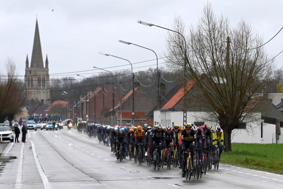 WEVELGEM BELGIUM  MARCH 26 LR Jos Van Emden of The Netherlands and Team JumboVisma and Tim Declercq of Belgium and Team Soudal  Quick Step leads the peloton during the 85th GentWevelgem in Flanders Fields 2023 Mens Elite a 2609km one day race from Ypres to Wevelgem  UCIWT  on March 26 2023 in Wevelgem Belgium Photo by Tim de WaeleGetty Images