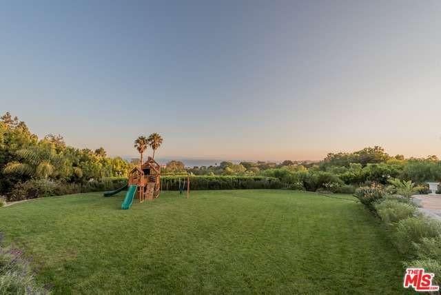 <p>It’s sprawling property is also home to a fire pit and playground. (Realtor.com) </p>