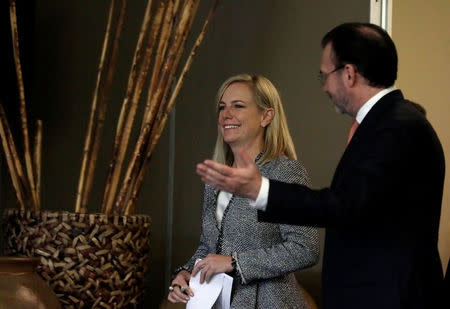 U.S. Homeland Security Secretary Kirstjen Nielsen arrives with Mexico's Foreign Minister Luis Videgaray to deliver a joint message in Mexico City, Mexico March 26, 2018. REUTERS/Henry Romero