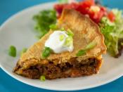 <p>This taco pie is a great alternative to a build-your-own taco bar. It can be made ahead of time and baked off right before the party. Just slice it up and set out some traditional toppings, buffet-style so everyone can customize. Be sure to let it stand before serving, as that’s the key to everything holding together. </p> <p><a href="https://www.myrecipes.com/recipe/heavenly-taco-pie" rel="nofollow noopener" target="_blank" data-ylk="slk:Heavenly Taco Pie Recipe;elm:context_link;itc:0;sec:content-canvas" class="link ">Heavenly Taco Pie Recipe</a></p>