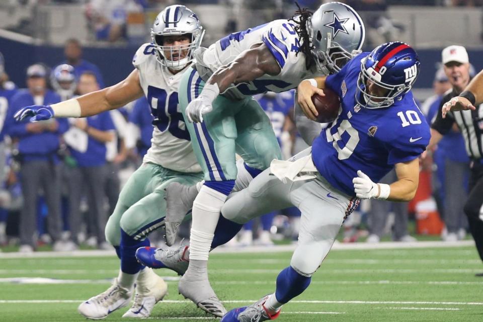 Eli Manning was sacked six times in the defeat against the Dallas Cowboys