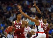Mar 22, 2019; Columbia, SC, USA; Oklahoma Sooners forward Kristian Doolittle (21) is defended by Mississippi Rebels guard Blake Hinson (0) during the second half in the first round of the 2019 NCAA Tournament at Colonial Life Arena. Mandatory Credit: Bob Donnan-USA TODAY Sports