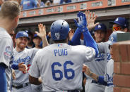Los Angeles Dodgers' Yasiel Puig (66) celebrates his home run against the San Francisco Giants during the second inning of a baseball game in San Francisco, Saturday, Sept. 29, 2018. (AP Photo/Jim Gensheimer)