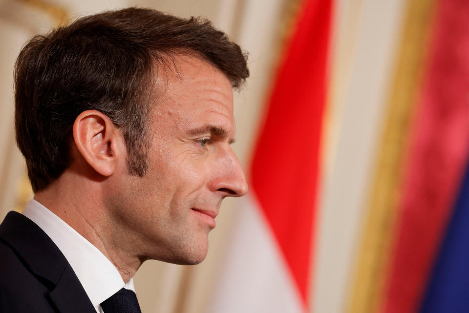 French President Emmanuel Macron looks on as he attends a news conference with Dutch Prime Minister Mark Rutte (not pictured) during Macron's state visit to the Netherlands, in Amsterdam, Netherlands April 12, 2023. REUTERS/Piroschka van de Wouw