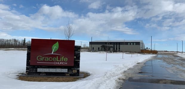 In an emailed statement to CBC News, RCMP confirmed they were on scene at the church Wednesday, assisting the AHS as they affect a closure under Section 62.1 of the Alberta Public Health Act. (Andreane Williams/Radio-Canada - image credit)