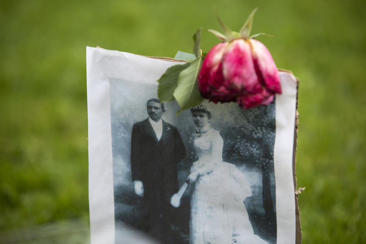 A photograph of Charles and Willa Bruce is part of a memorial to Emmett Till, located in front of a commemorative plaque at Bruce's Beach, a park located in Manhattan Beach. Till was a 14-year-old African American who was lynched in Mississippi in 1955.