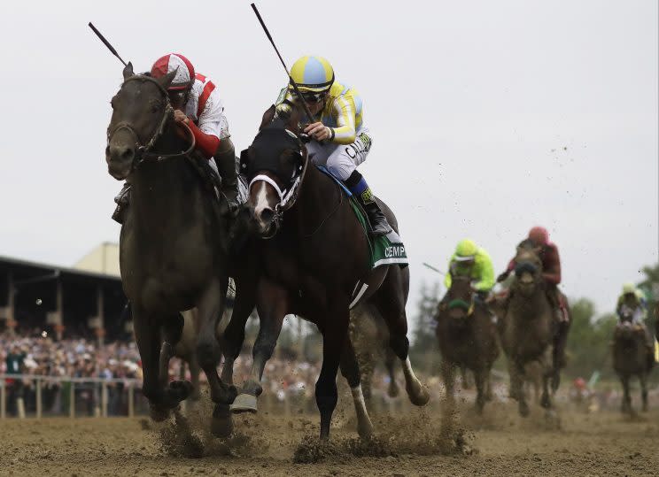 Cloud Computing beats Classic Empire by a nose to win the Preakness Stakes. (AP)