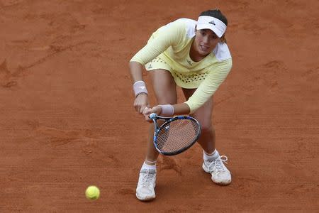 Tennis - French Open - Roland Garros - Anna Karolina Schmiedlova of Slovakia vs Garbine Muguruza of Spain - Paris, France - 23/05/16. Garbine Muguruza returns the ball. REUTERS/Pascal Rossignol