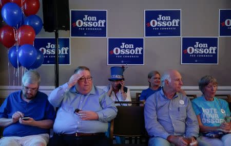 Supporters of Democrat Jon Ossoff wait for the polls to come in at Ossoff's election night event in Atlanta, Georgia, U.S., June 20, 2017. REUTERS/Chris Aluka Berry
