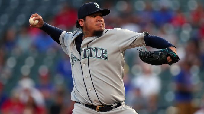 ARLINGTON, TX - SEPTEMBER 14:  Felix Hernandez #34 of the Seattle Mariners pitches against the Texas Rangers in the bottom of the first inning at Globe Life Park in Arlington on September 14, 2017 in Arlington, Texas.