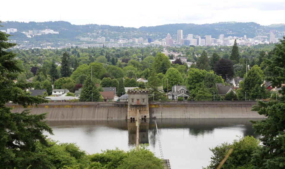 This June 29, 2011 shows Portland's reservoir No. 6 in Mount Tabor Park in Portland, Ore. Portland is the largest city in the United States that has yet to approve fluoridation to combat tooth decay, a distinction set to change at a City Council meeting on Wednesday, Sept. 12, 2012. Mayor Sam Adams and two city commissioners have announced their support, ensuring a majority on the five-member panel. Many in Portland and the state at large have long opposed public fluoridation, saying it's unsafe and violates an individual's right to consent to medication. While 73 percent of the U.S. population drinks water treated with fluoride, the rate is less than 25 percent in Oregon. (AP Photo/Rick Bowmer)