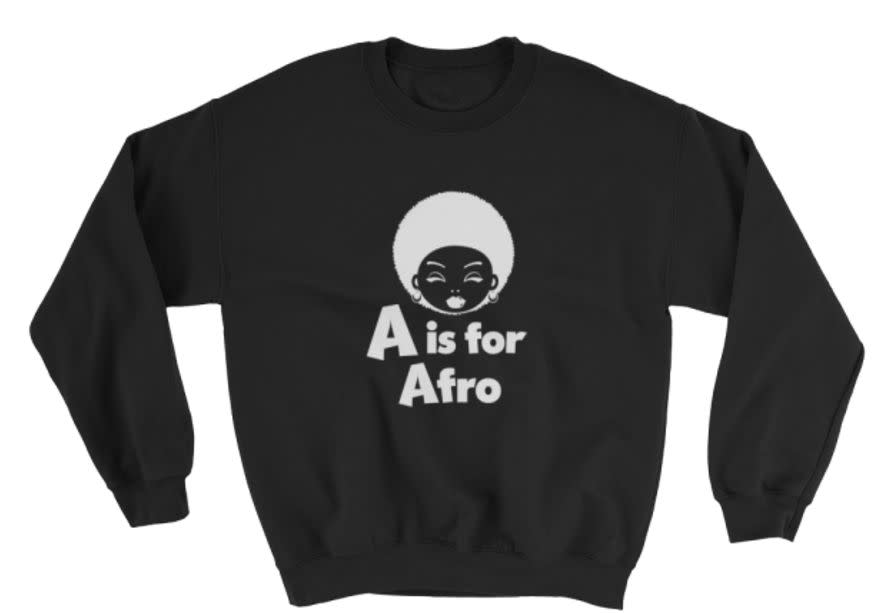 An alphabet lesson for the ages. <a href="https://jaridesigns.com/design/a-is-for-afro-black-pullover-sweatshirt-for-kids/" target="_blank">Buy here</a> for $25.50.&nbsp;