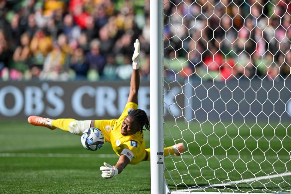 July 20: Nigeria's goalkeeper Chiamaka Nnadozie saves a penalty kick by Canada's forward Christine Sinclair during the World Cup at Melbourne Rectangular Stadium.