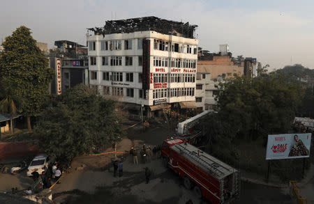 A fire brigade is seen outside a hotel where a fire broke out in New Delhi, India, February 12, 2019. REUTERS/Anushree Fadnavis