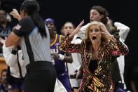 LSU head coach Kim Mulkey reacts to a call during the first half of the NCAA Women's Final Four championship basketball game against Iowa Sunday, April 2, 2023, in Dallas. (AP Photo/Tony Gutierrez)