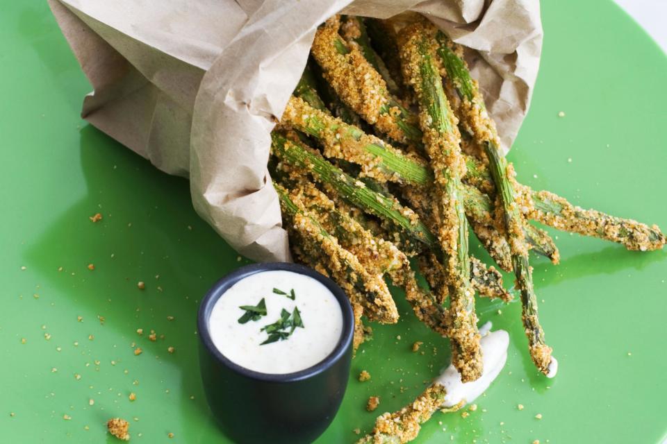 In this image taken on March 11, 2013, almond-crusted bake-fried asparagus is shown in Concord, N.H. (AP Photo/Matthew Mead)