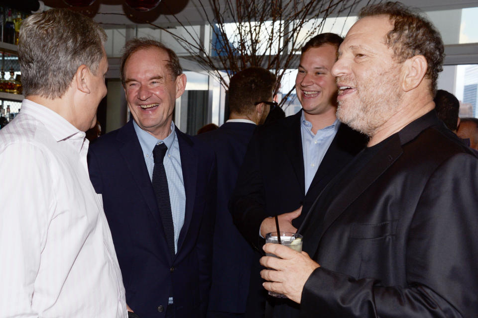 New York Times publisher Arthur Sulzberger, left, lawyer David Boies, a guest and studio executive Harvey Weinstein attend a cocktail party in New York City in 2014. (Photo: Patrick McMullan via Getty Images)