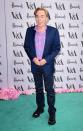 <p>Wearing a colour-popping shirt with a navy blue suit.<i> [Photo: PA Images]</i></p>