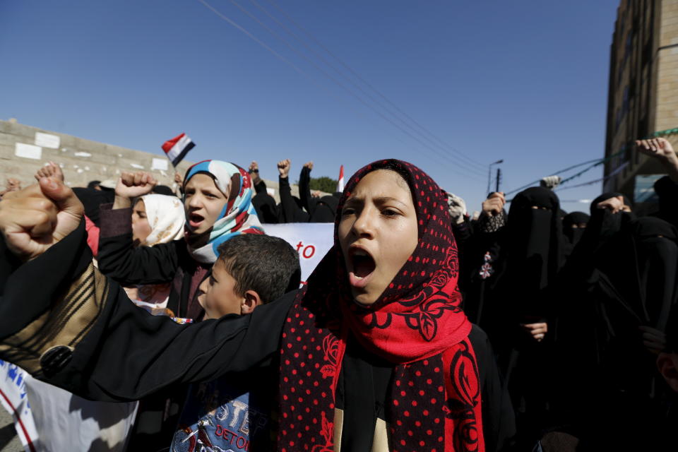 Children and women protest outside the United Nations offices against Saudi-led air strikes in Yemen's capital Sanaa on Jan. 21, 2016.