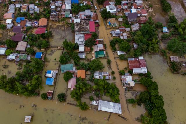 An aerial view of flooded houses after Typhoon Vamco hit on 16 November 2020  (Getty Images)