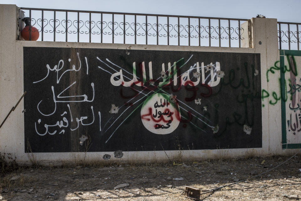 An Islamic State sign in the north-western Iraq town of Ba'aj, June 20, 2017, near the Iraq-Syria border.  (Photo: Martyn Aim/Getty Images)