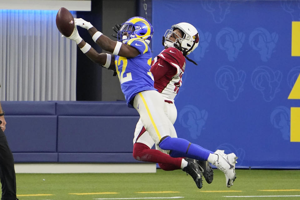 Los Angeles Rams strong safety Jordan Fuller, left, breaks up a pass intended for Arizona Cardinals wide receiver DeAndre Hopkins during the second half of an NFL football game in Inglewood, Calif., Sunday, Jan. 3, 2021. (AP Photo/Jae C. Hong)