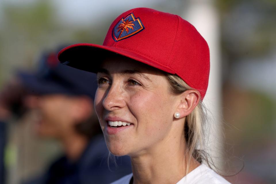 Hockey player Zoe Hickel participates in the Coachella Valley Firebirds and Acrisure Arena street hockey clinic at Mecca Community Park in Mecca, Calif., on Monday, May 23, 2022. 